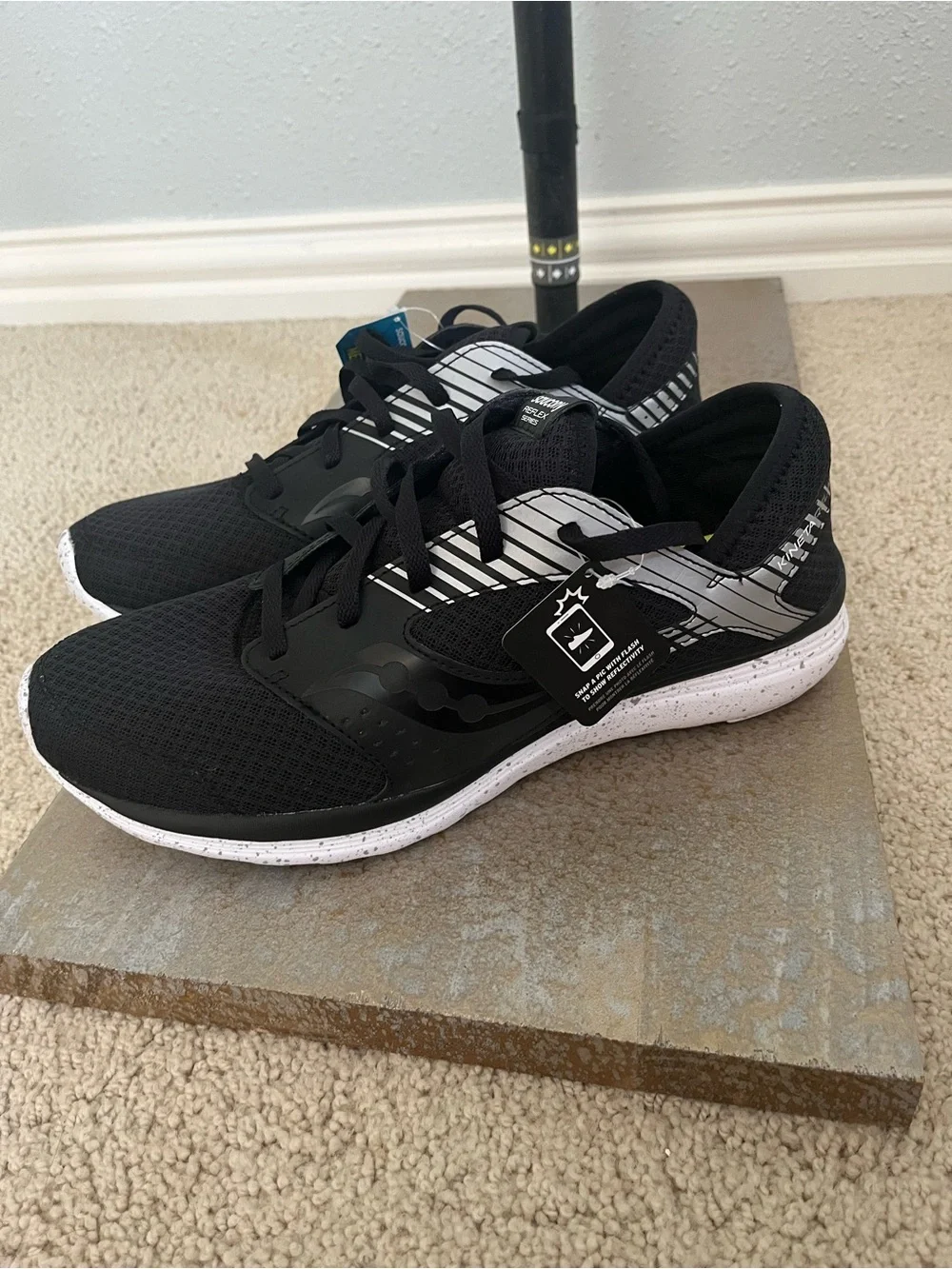 Saucony Men’s Black Athletic Shoes with White Speckled Soles